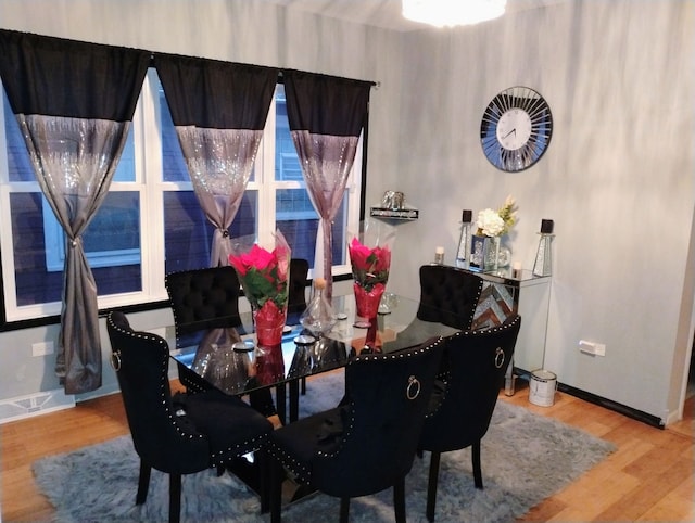 11414 S Wallace St, Chicago, IL 60628 - dining area featuring baseboards and wood finished floors