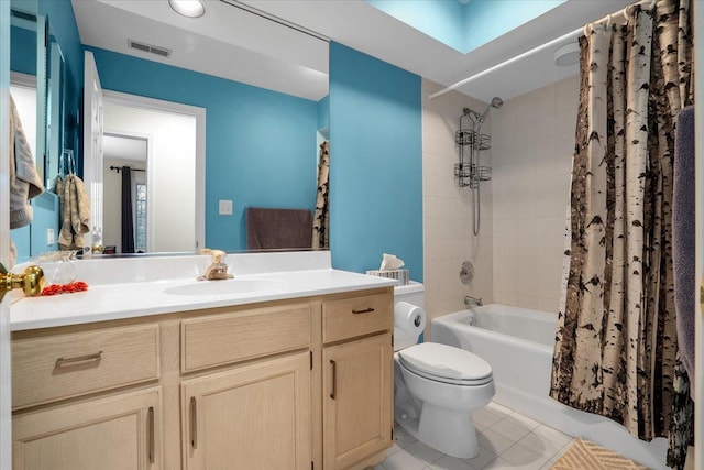 full bath featuring shower / bath combo, vanity, tile patterned floors, toilet, and visible vents