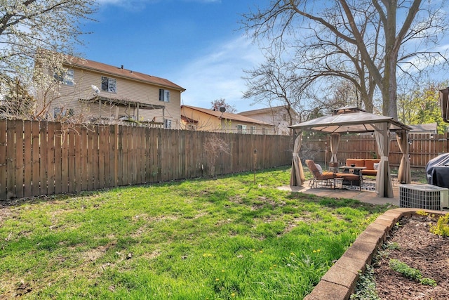 1 Red Wing Ct, Woodridge, IL 60517 - view of yard featuring an outdoor living space, a gazebo, a fenced backyard, and a patio area