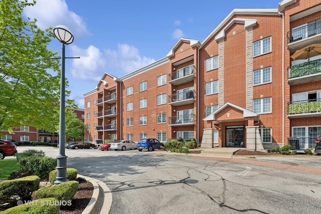 3501 Wellington Ct Unit 410, Rolling Meadows, IL 60008 - view of apartment building / complex with uncovered parking