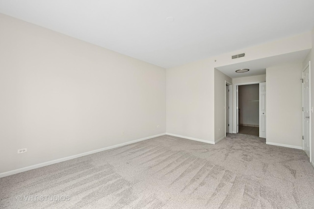 3501 Wellington Ct Unit 410, Rolling Meadows, IL 60008 - spare room with baseboards and carpet floors