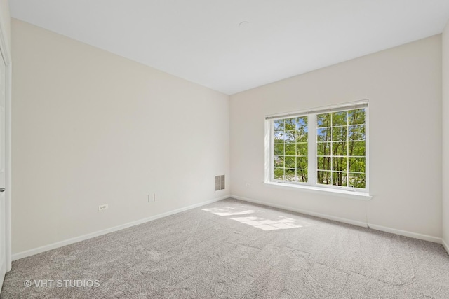 3501 Wellington Ct Unit 410, Rolling Meadows, IL 60008 - carpeted empty room featuring baseboards