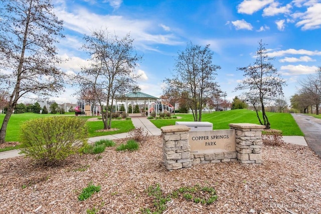 view of home's community with a gazebo and a lawn