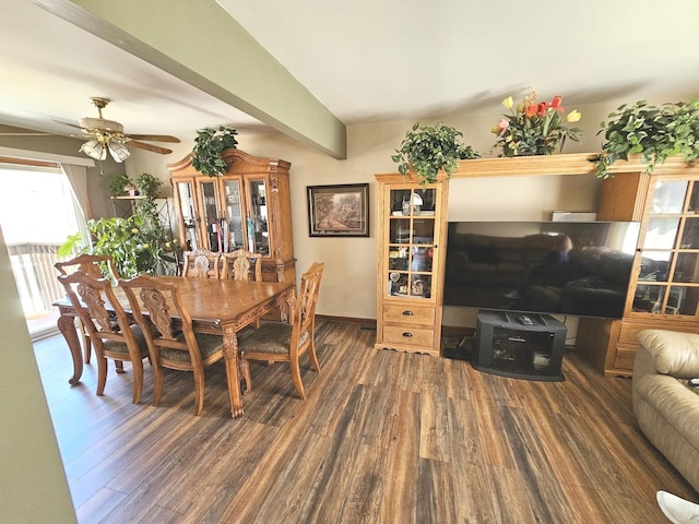 dining room with wood finished floors, ceiling fan, and baseboards