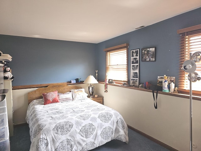 bedroom featuring visible vents and carpet floors