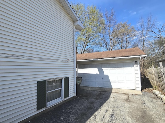 detached garage with fence
