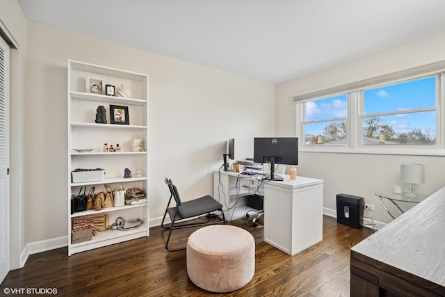 office with baseboards and dark wood-type flooring