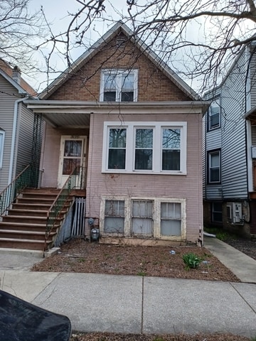 bungalow-style home with a porch