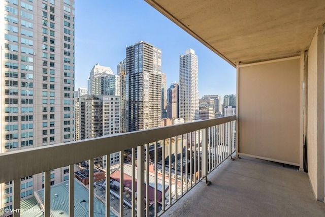 balcony featuring a view of city