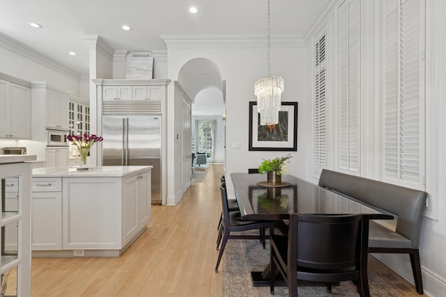 2215 N Lakewood Ave, Chicago, IL 60614 - dining space with recessed lighting, a chandelier, light wood-style floors, visible vents, and crown molding