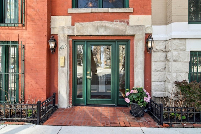 1400 N La Salle St Unit 3N, Chicago, IL 60610 - view of exterior entry featuring brick siding and stone siding