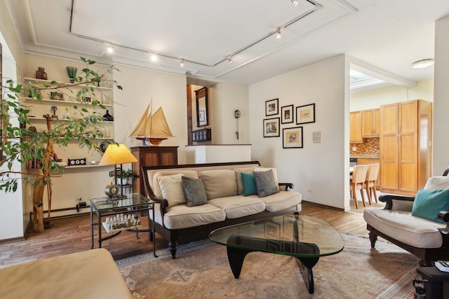 1400 N La Salle St Unit 3N, Chicago, IL 60610 - living room featuring rail lighting, wood finished floors, and baseboards