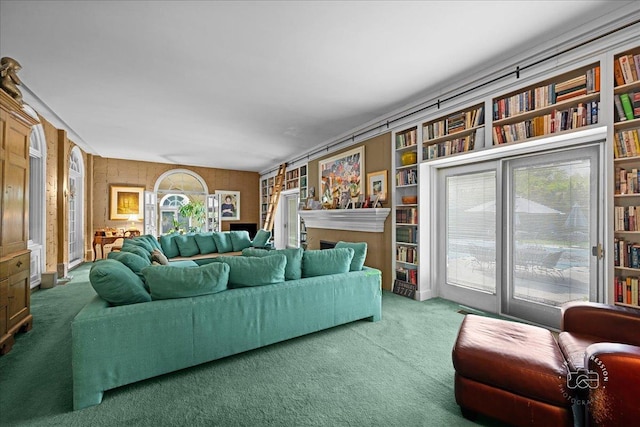 carpeted living room featuring built in features