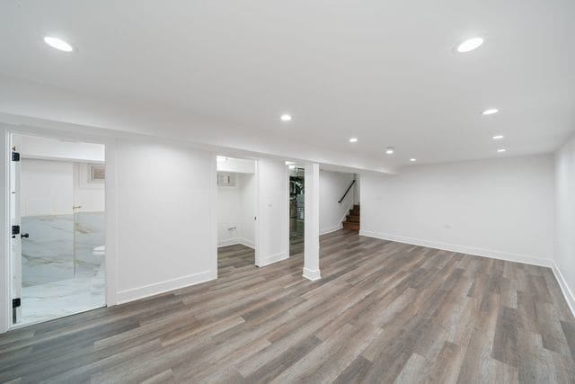 519 E 91st St, Chicago, IL 60619 - finished basement with baseboards, recessed lighting, wood finished floors, and stairs
