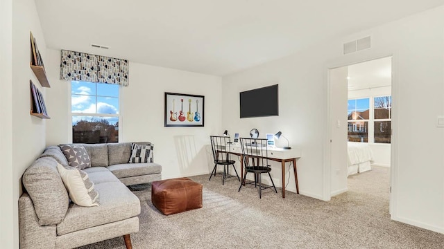 260 Snowdrop Ln, Elgin, IL 60124 - living area featuring carpet, visible vents, plenty of natural light, and baseboards