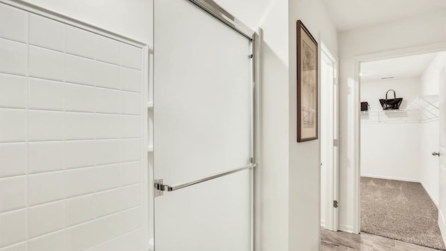 260 Snowdrop Ln, Elgin, IL 60124 - hallway with baseboards and light colored carpet
