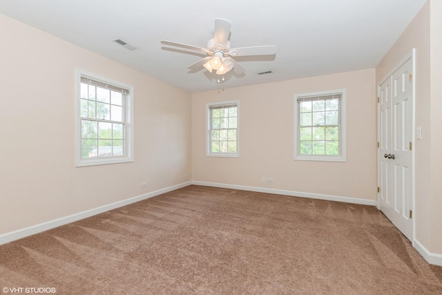 12521 S Harold Ave, Palos Heights, IL 60463 - unfurnished bedroom with baseboards, a ceiling fan, visible vents, and carpet floors