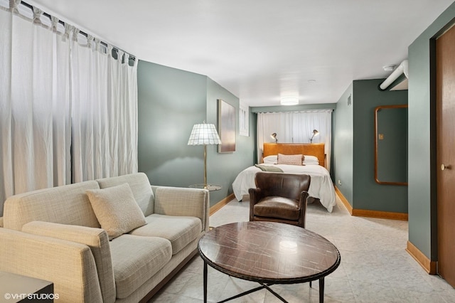 bedroom with baseboards