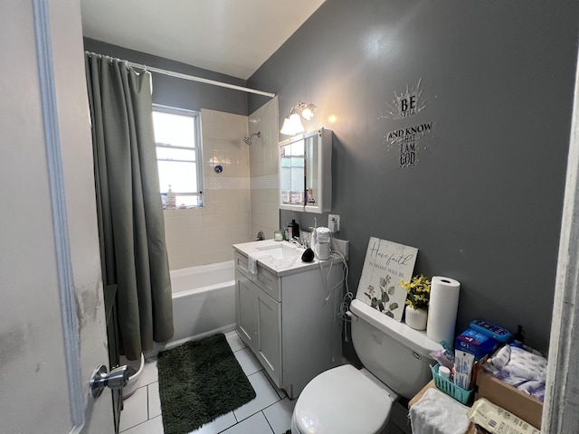 full bath with vanity, tile patterned flooring, toilet, and shower / tub combo