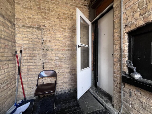 6331 S Throop St, Chicago, IL 60636 - kitchen with a sink, a wainscoted wall, marble finish floor, black appliances, and visible vents