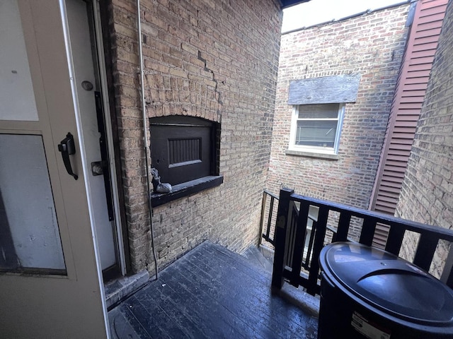exterior space featuring brick siding