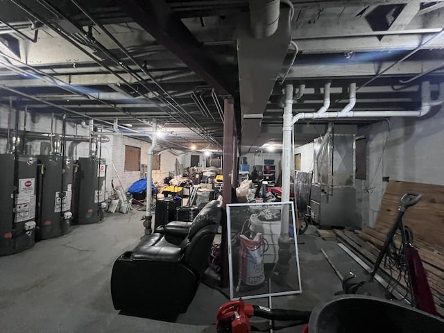 unfinished below grade area with heating unit and gas water heater