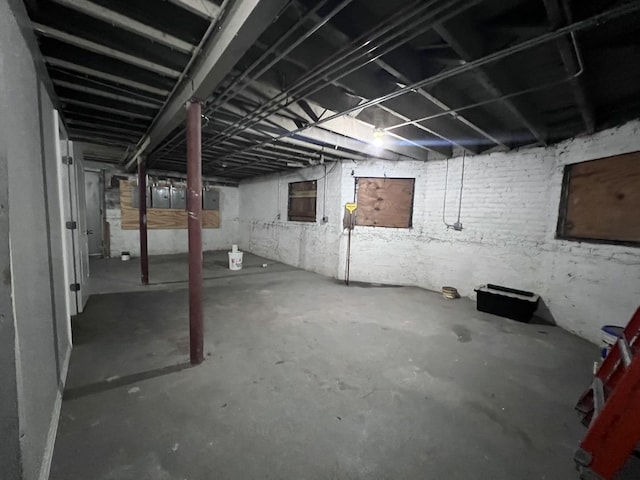 unfinished below grade area featuring electric panel