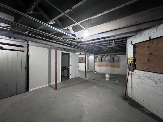 unfinished basement with electric panel