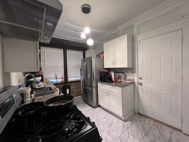 kitchen featuring a sink, freestanding refrigerator, black gas range, and white cabinetry