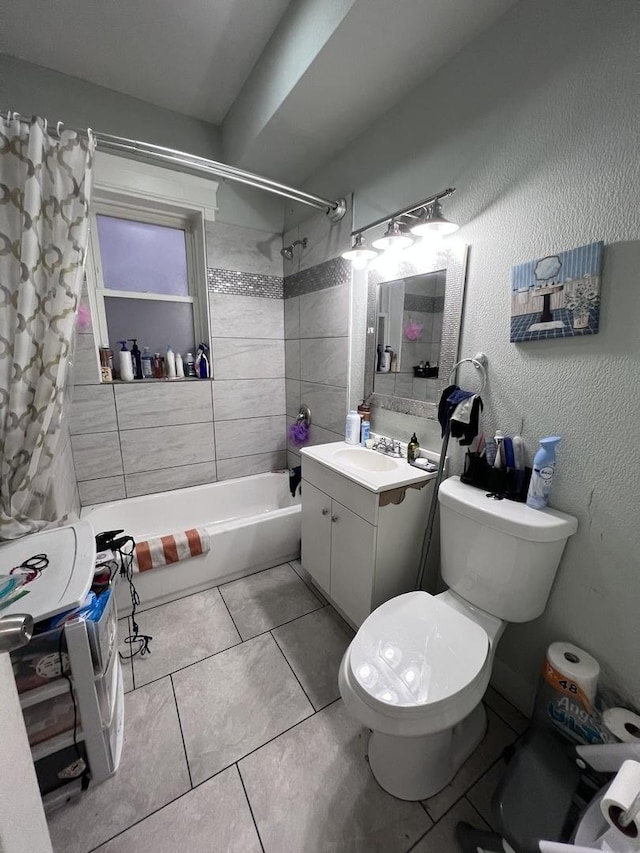 bathroom featuring shower / bath combo with shower curtain, tile patterned flooring, toilet, and vanity
