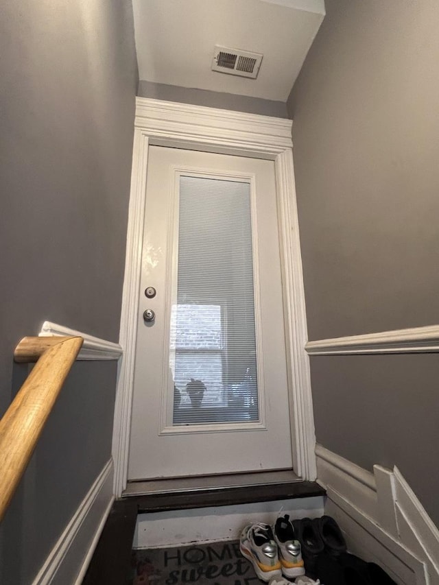 doorway to property featuring visible vents