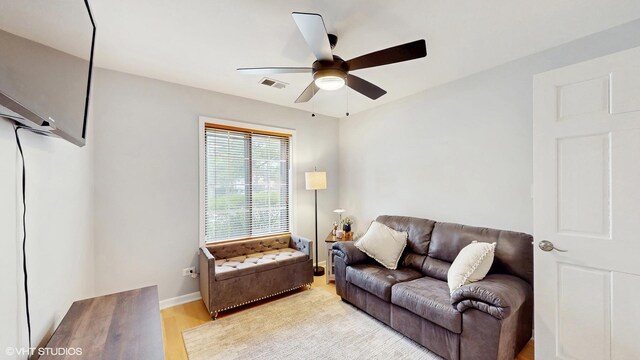 1670 W Partridge Ln Unit 5, Arlington Heights, IL 60004 - living area featuring baseboards, ceiling fan, light wood-type flooring, and visible vents