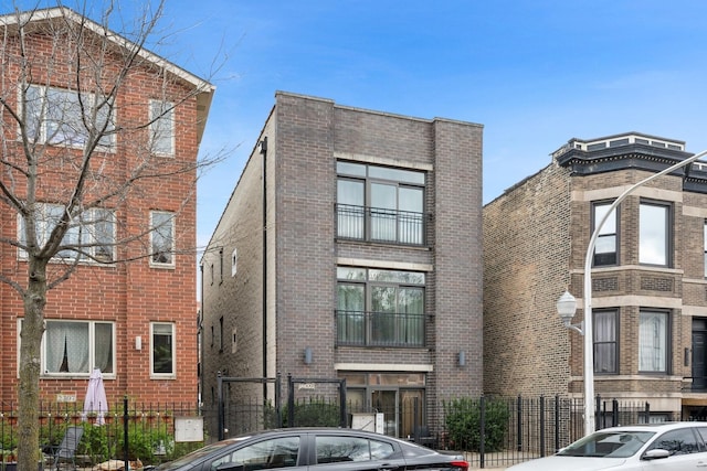 2309 W 21st St Unit 2, Chicago, IL 60608 - exterior space with brick siding and fence