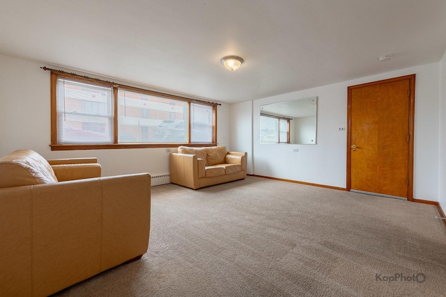 living room featuring carpet flooring, baseboards, and a baseboard radiator