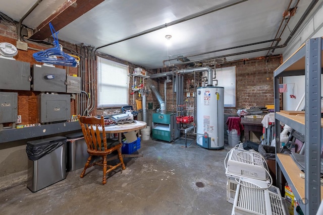 basement featuring a heating unit, a workshop area, electric panel, and gas water heater