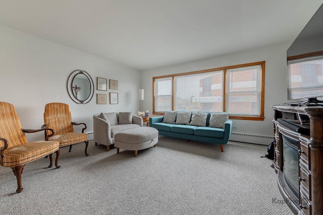 carpeted living area featuring baseboard heating