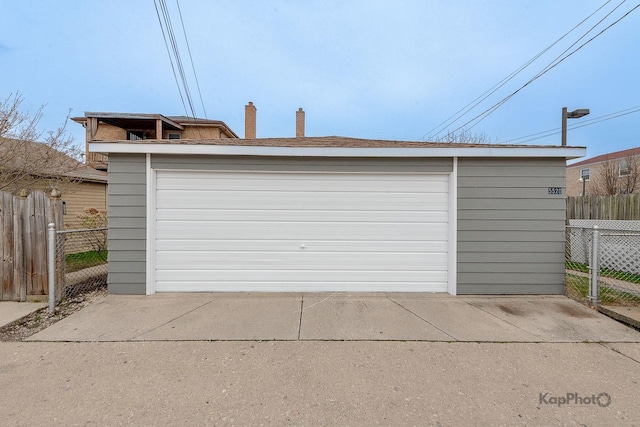 detached garage with fence