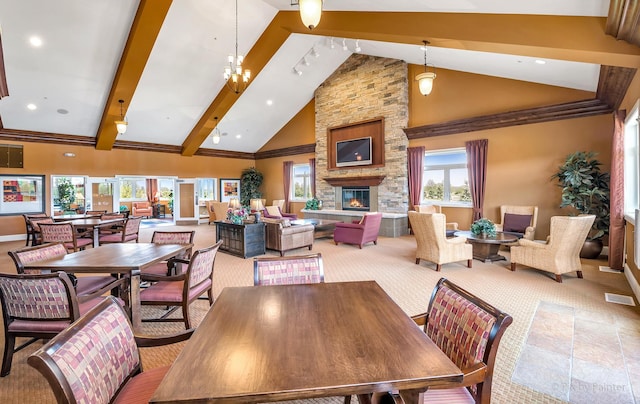 carpeted dining area with visible vents, a fireplace, high vaulted ceiling, baseboards, and recessed lighting