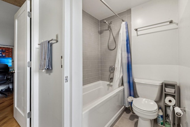 bathroom with toilet and shower / bathtub combination with curtain