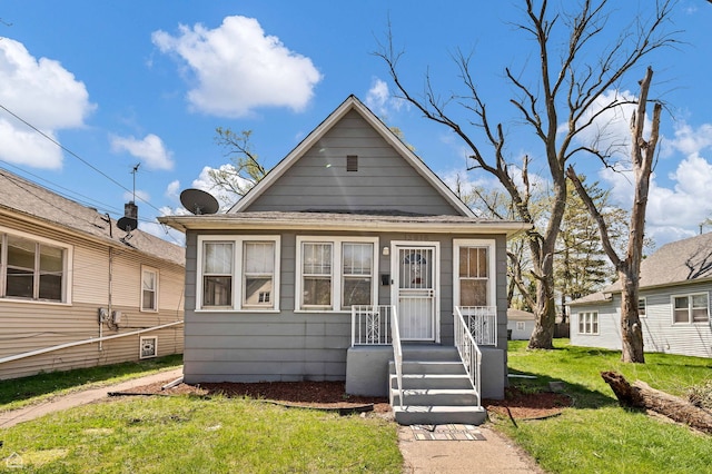 view of front of house with a front lawn