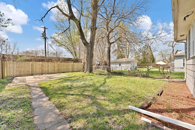 view of yard featuring a fenced backyard
