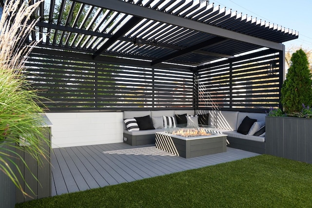 deck featuring an outdoor living space with a fire pit and a pergola