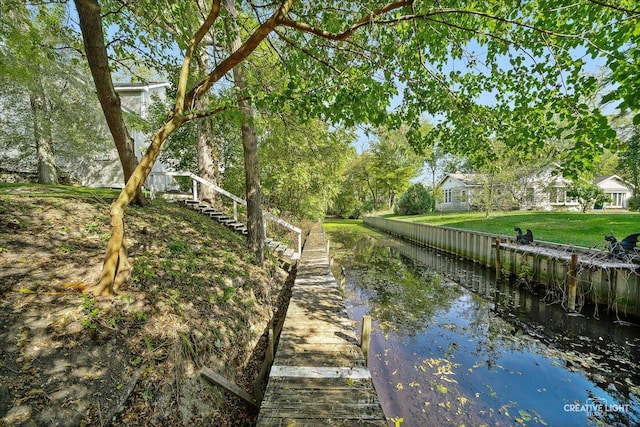 dock area featuring a water view