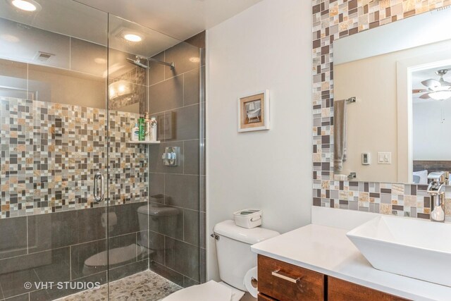1754 W Wellington Ave Unit 1W, Chicago, IL 60657 - bathroom with a shower stall, vanity, toilet, recessed lighting, and backsplash