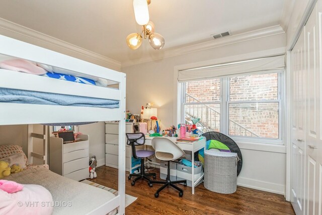 1754 W Wellington Ave Unit 1W, Chicago, IL 60657 - bedroom featuring ornamental molding, a chandelier, wood finished floors, a desk, and baseboards