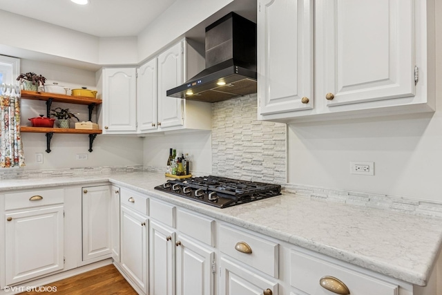 28139 W Okelly Dr, Ingleside, IL 60041 - kitchen featuring wall chimney range hood, gas cooktop, and white cabinetry
