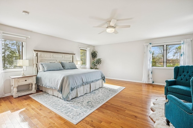 28139 W Okelly Dr, Ingleside, IL 60041 - bedroom featuring baseboards, multiple windows, and light wood-type flooring
