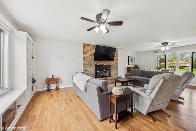 28139 W Okelly Dr, Ingleside, IL 60041 - living area with a fireplace, a ceiling fan, and light wood finished floors