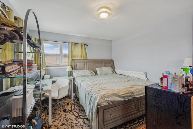 bedroom with crown molding