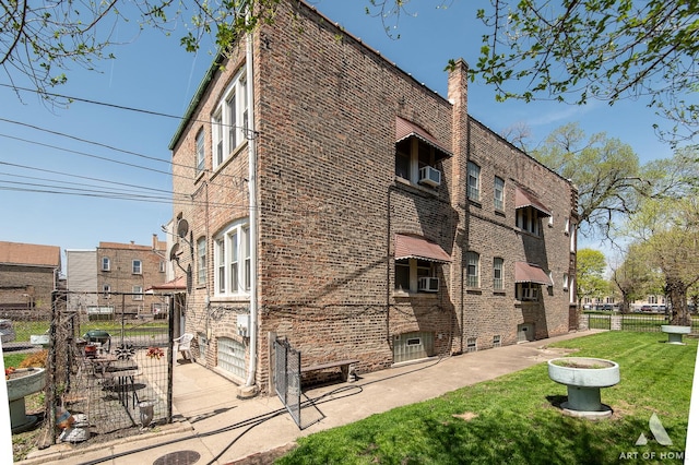 view of property with cooling unit and fence